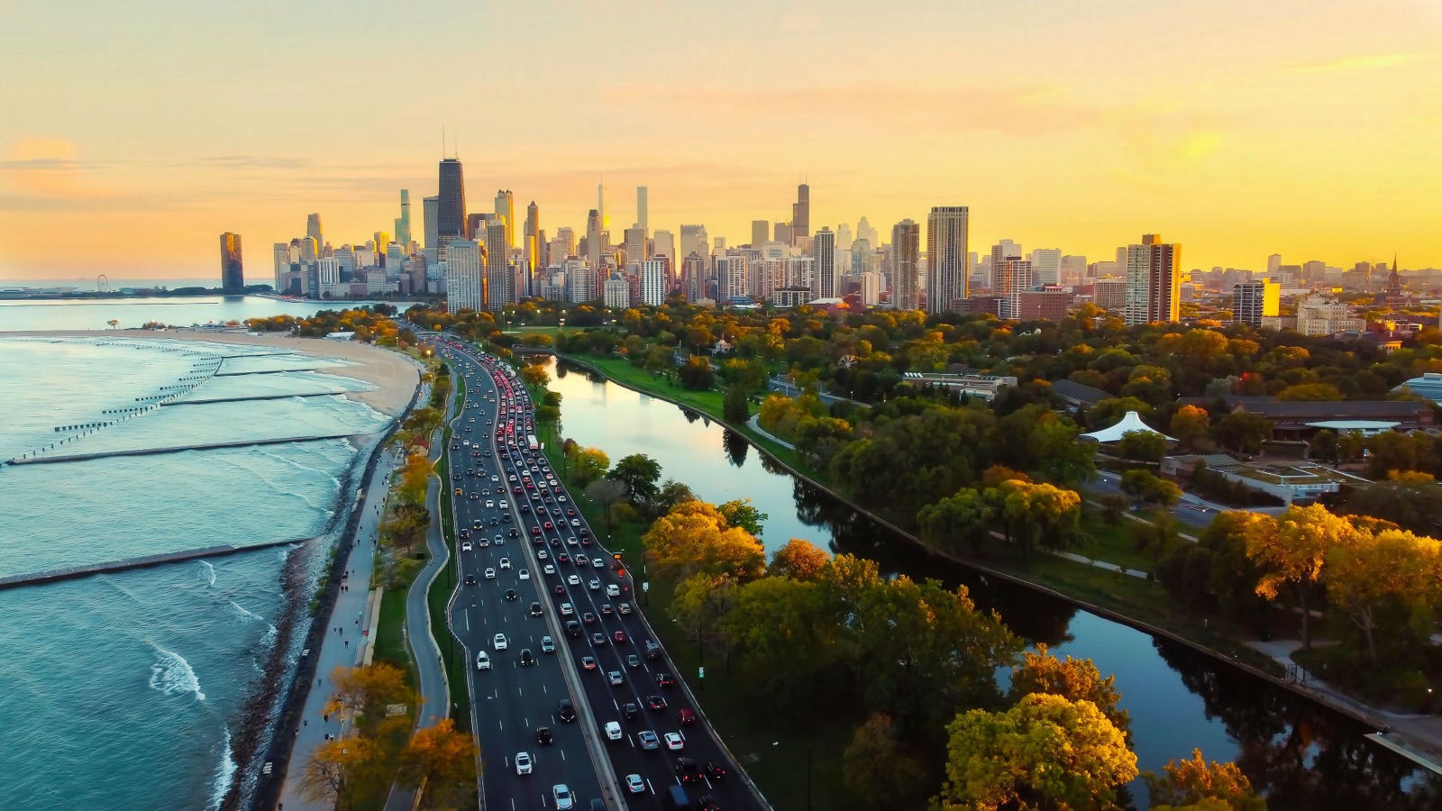 Aerial view of Chicago's Lake Shore Drive, lakefront and skyline at sunrise